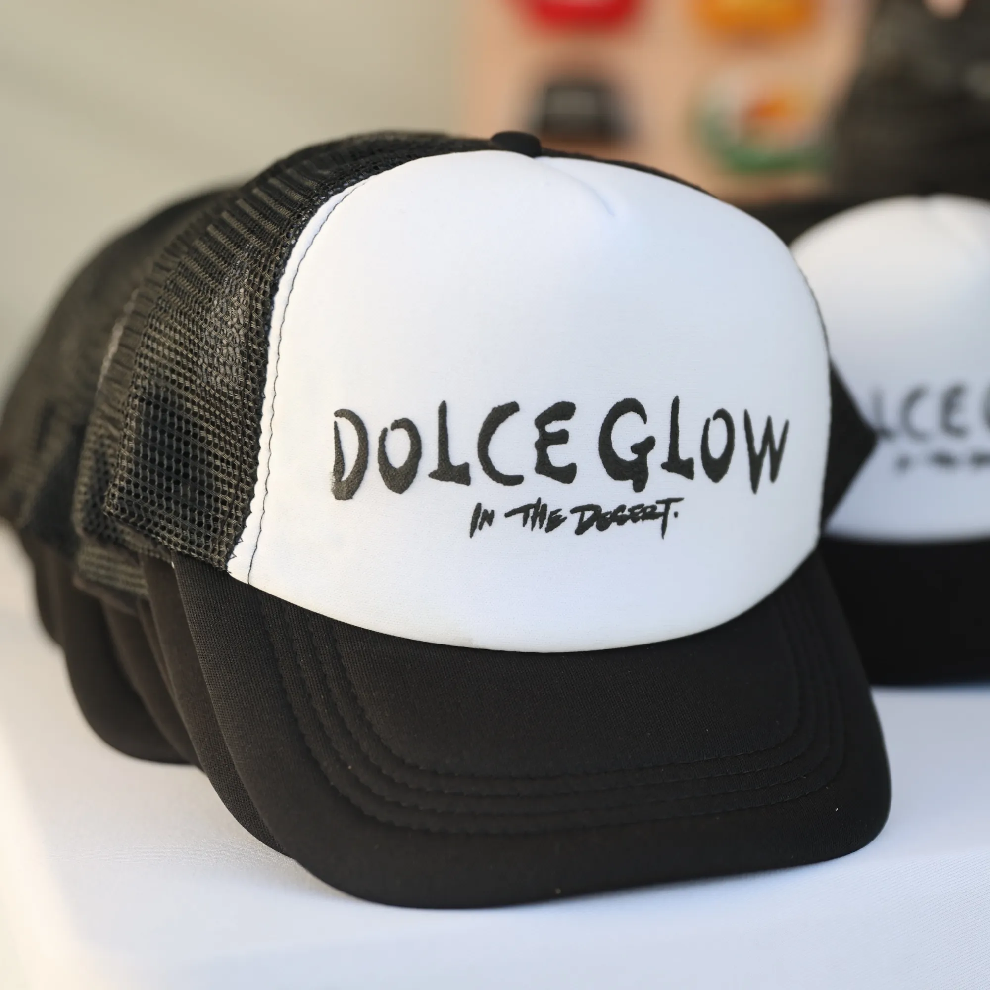 Dolce Glow in the Desert 2024 Trucker Hat